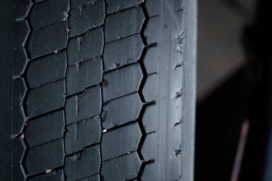 Checking tire tread depth and preparing for tire rotation