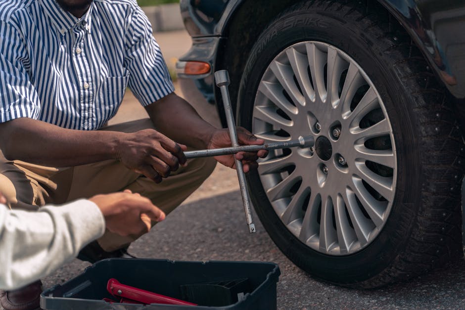 Professional mechanic preparing for tire installation